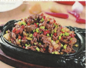 Buff Steak served on a Sizzling Iron Plate